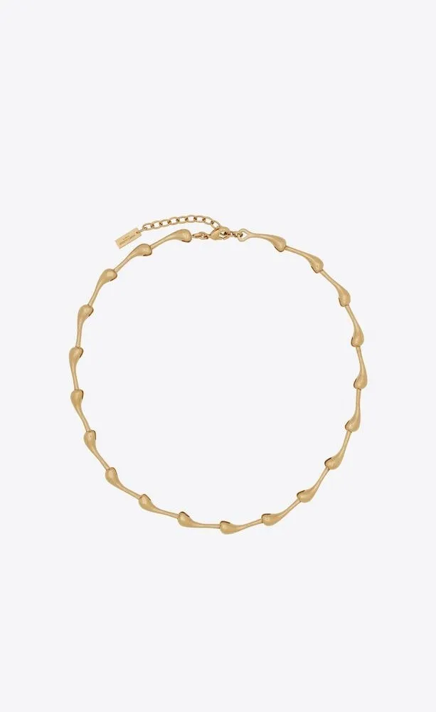 Yves Saint Laurent, multiple drop short necklace in metal, approx, ₹ 58,500