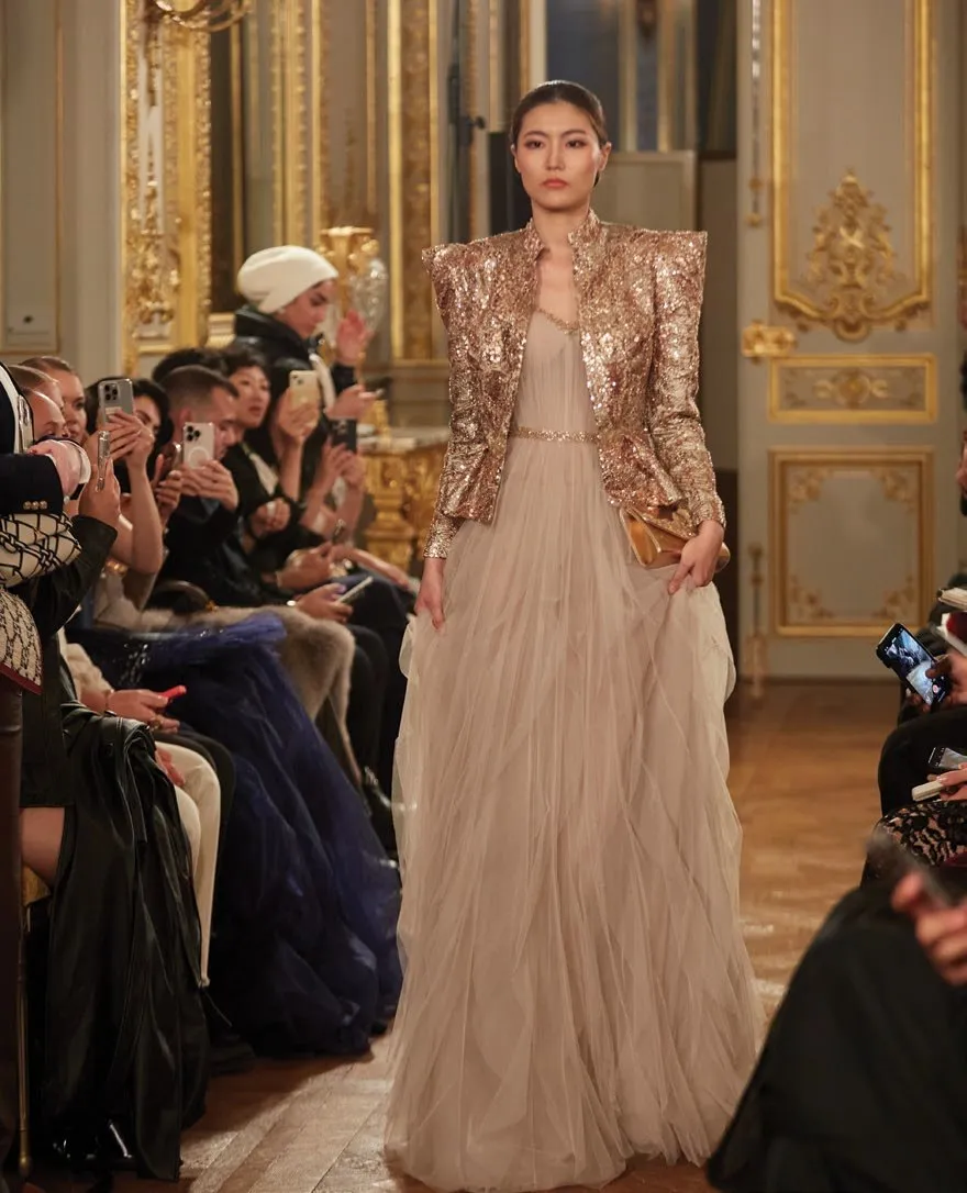 Global Fashion: A Synthesis of Legacy, Ethereal Charm, and Future Craftsmanship.